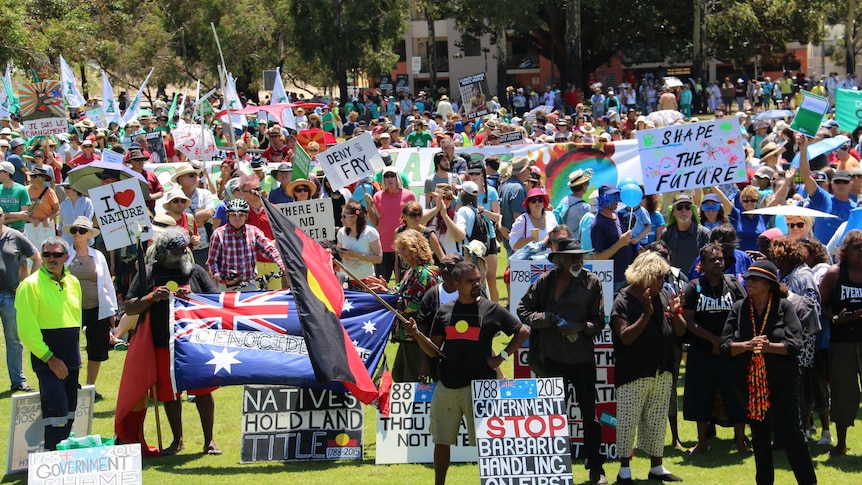 People gather in Perth calling for climate change action ahead of the Paris talks