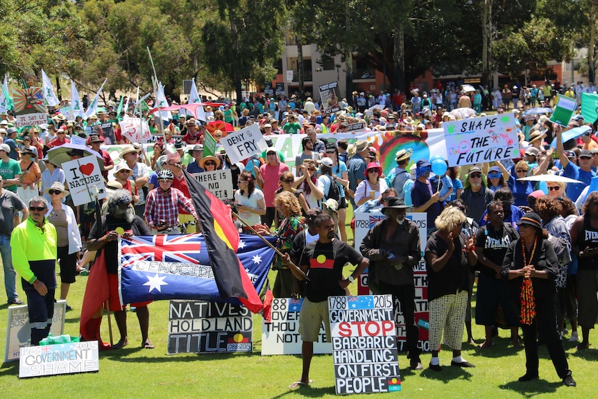 People gather in Perth calling for climate change action ahead of the Paris talks