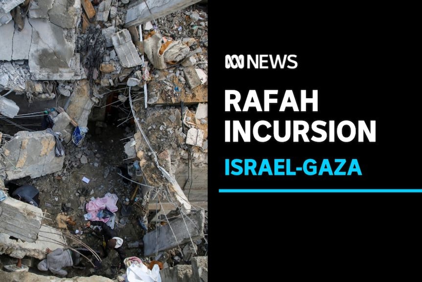Rafah Incursion, Israel-Gaza: Top-down view of a destroyed building. There is a large hole in its roof.