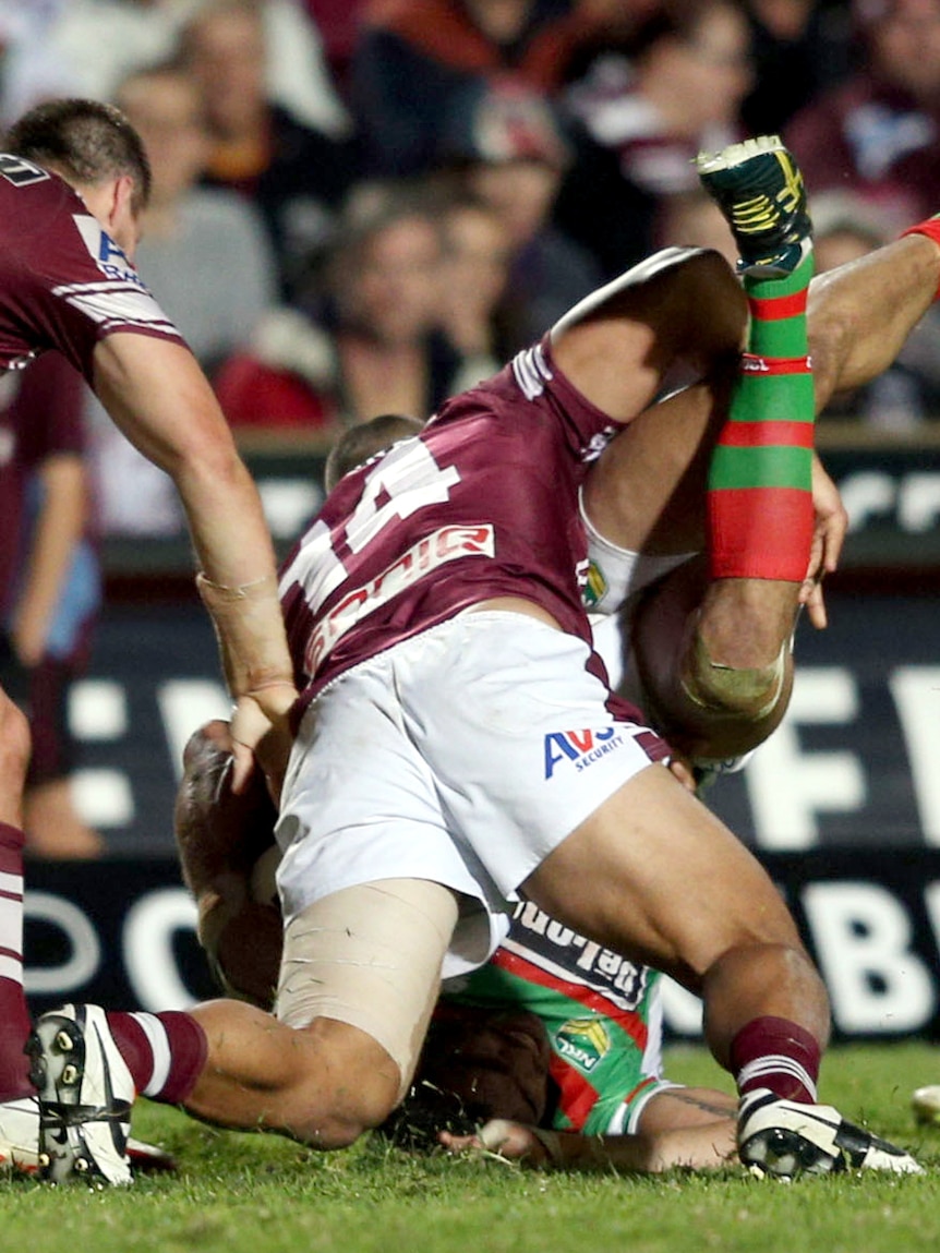 Unsavoury incident ... Greg Inglis is spear tackled by Richie Fa'aoso
