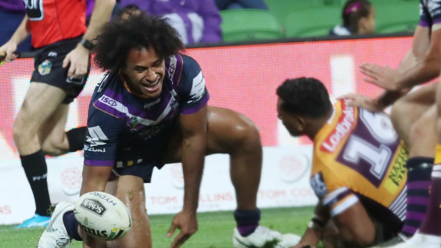 Felise Kaufusi scores a try for the Storm against Brisbane