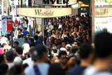 Shoppers are seen in the Central Business District in Sydney