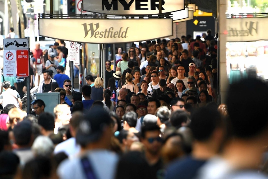 Shoppers are seen in the Central Business District in Sydney