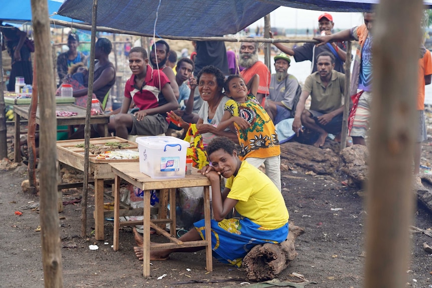 Local people gather on Daru Island.