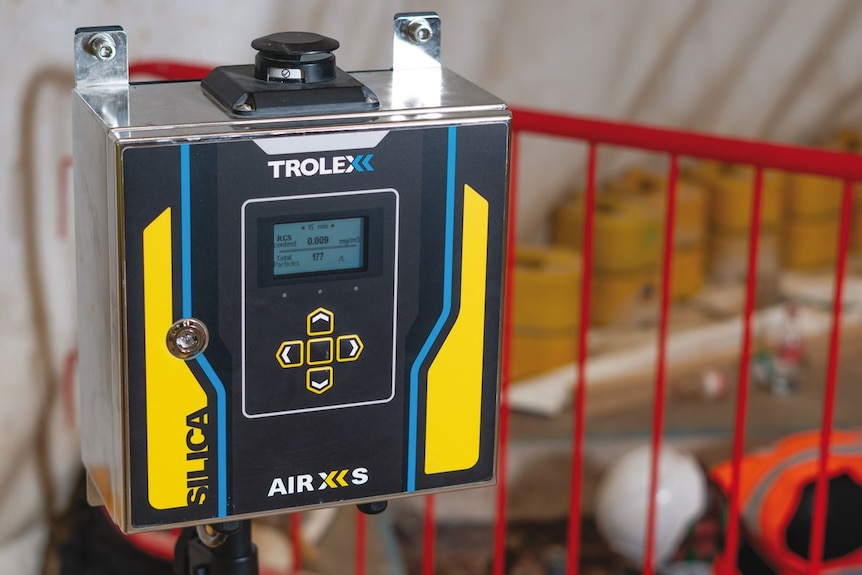 A chunky device with a tiny monitor that detects respirable crystalline silica.