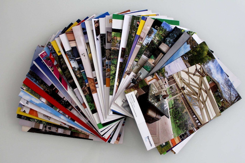 Housing brochures laid out like a fan.