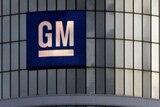 The GM logo sits on the General Motors headquarters in Detroit, Michigan