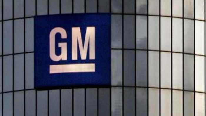 The GM logo sits on the General Motors headquarters in Detroit, Michigan