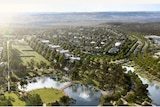 Digital aerial view of housing with farmland in the background