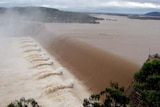 The Burdekin Falls Dam spills over.