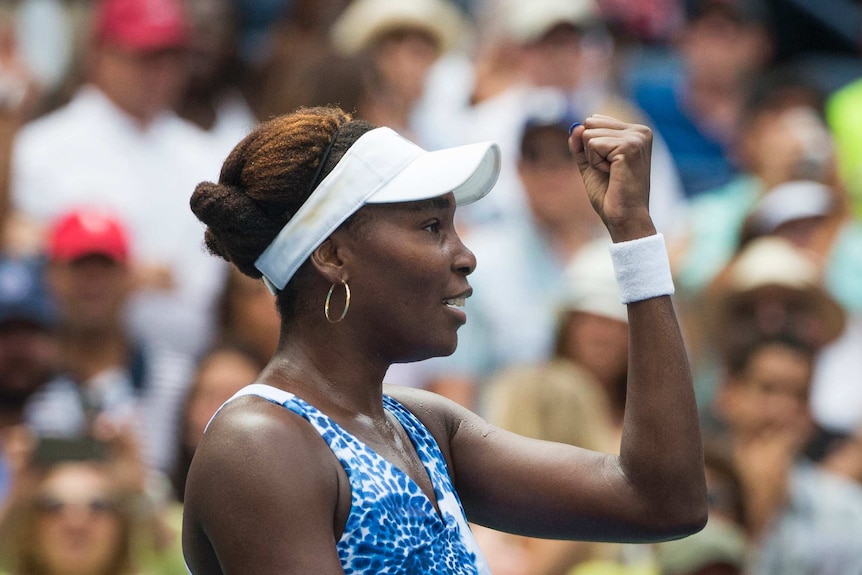 Venus Williams celebrates after beating Bencic