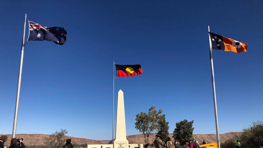 The Australian, Indigenous and NT flags fly at Anzac Hill