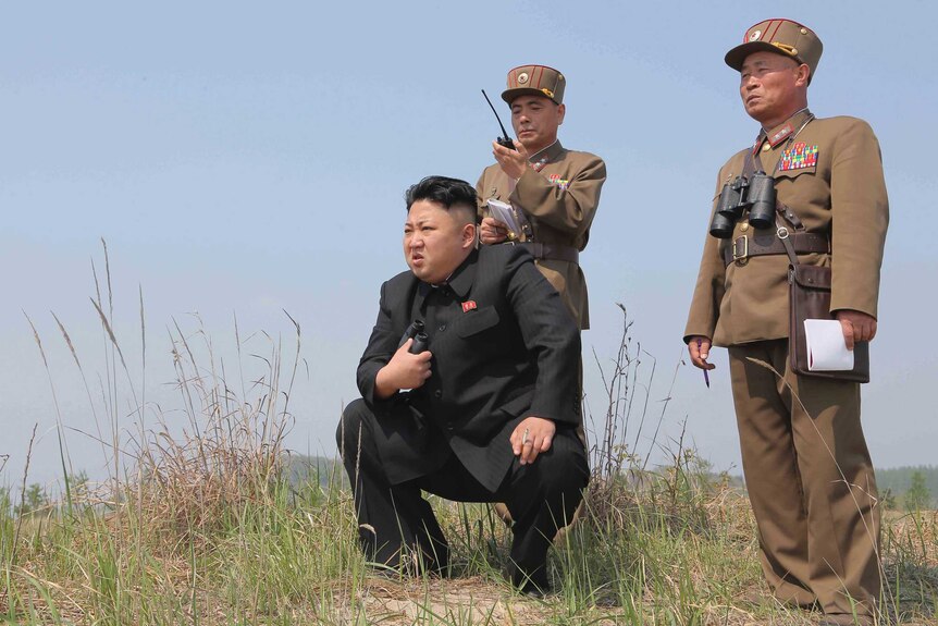 Kim Jong-Un guides a rocket-launch, 2014.