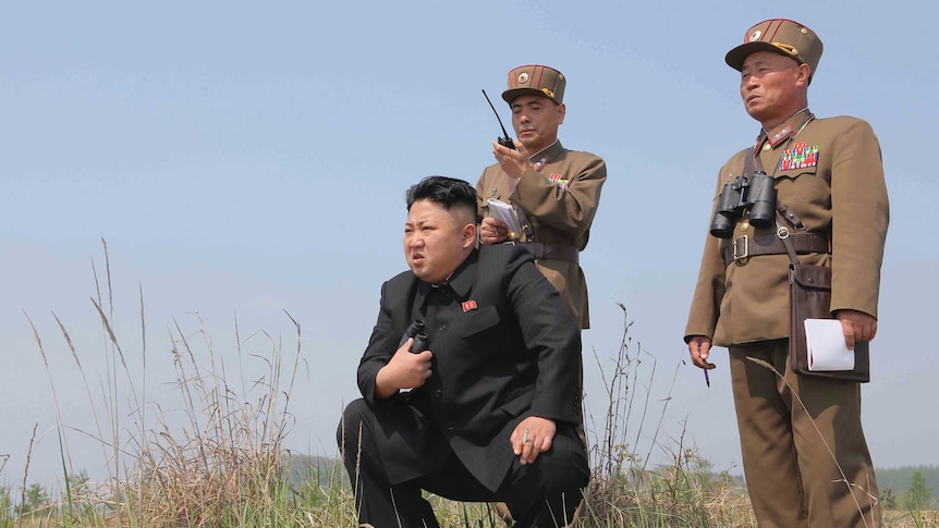 Kim Jong-Un guides a rocket-launch, 2014.