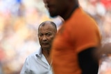 Eddie JOnes looks past a Wallabies player