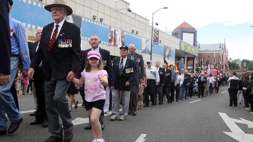 Veterans march in Ipswich on ANZAC Day.