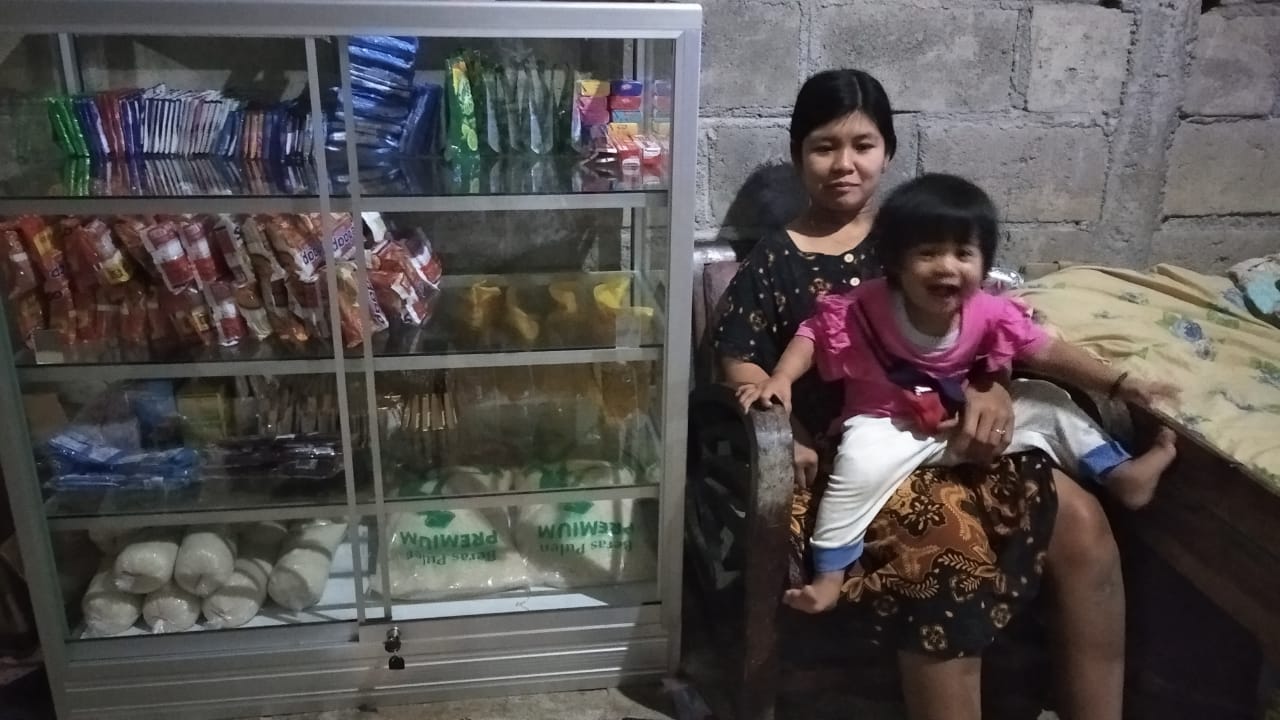 Andika and his shop at home