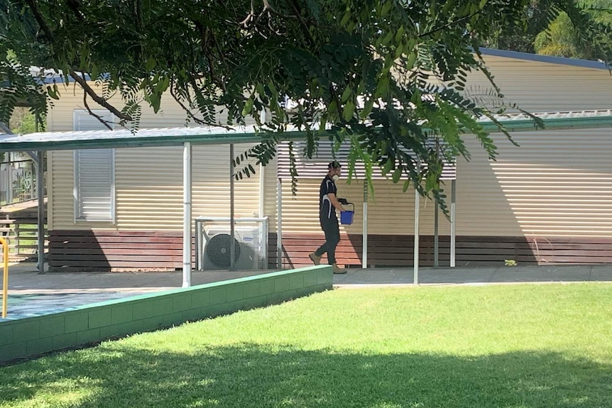 The school was being washed-down after one staffer at the YMCA Helensvale tested positive to COVID-19.