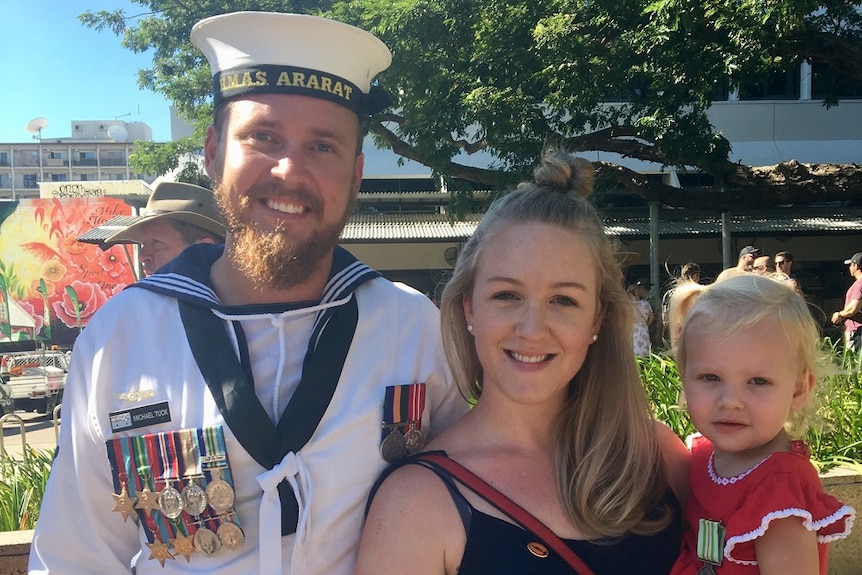 Michael, in uniform, along with Racheal and Chelsea Tuck