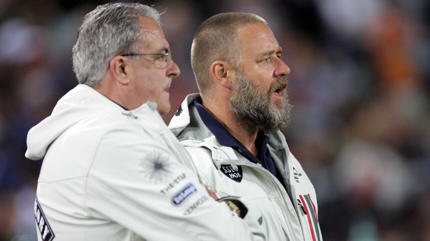 The Rabbitohs have confirmed Russell Crowe (R) is selling his stake in the club.