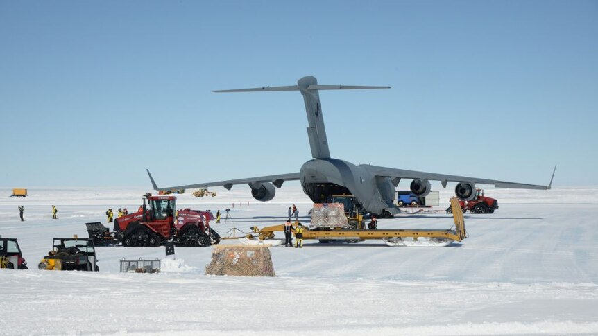 A plane unloads cargo in Antarctica