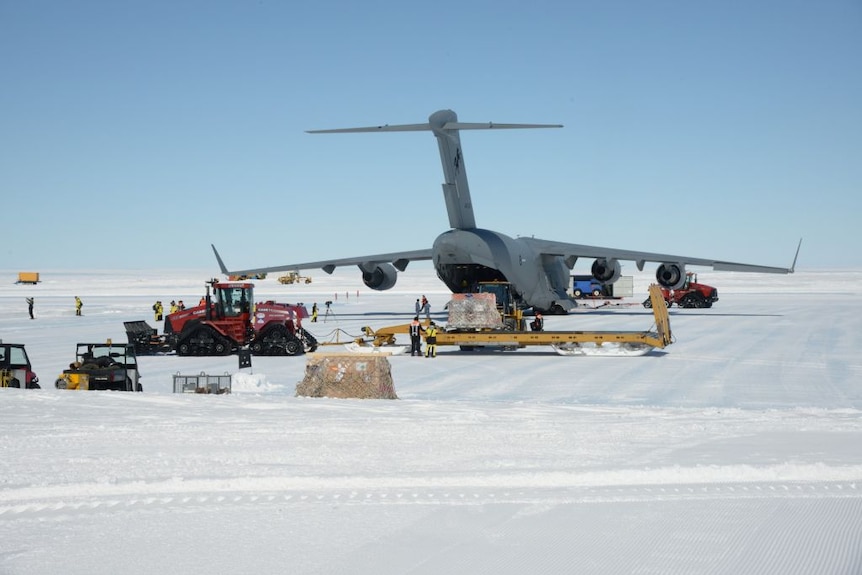A plane unloads cargo in Antarctica