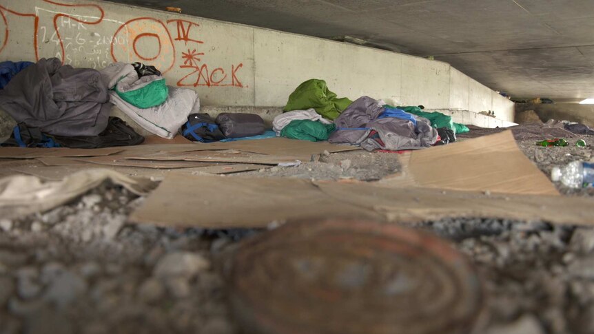 Sleeping bags from under a bridge in Calais