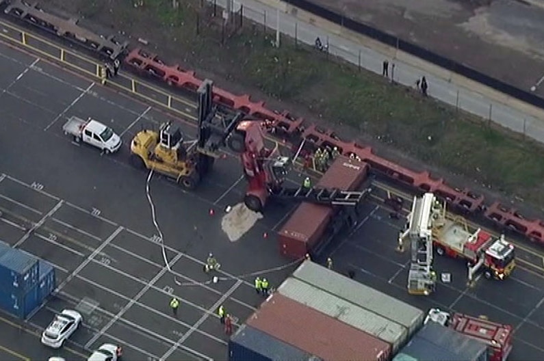 Emergency officials on the scene of the forklift accident.