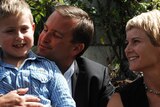 David Bartlett poses for family photos after resigning as Tas premier