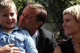 David Bartlett poses for family photos after resigning as Tas premier