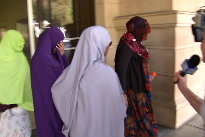 Zainab Abdirahman-Khalif leaves court after winning an appeal.