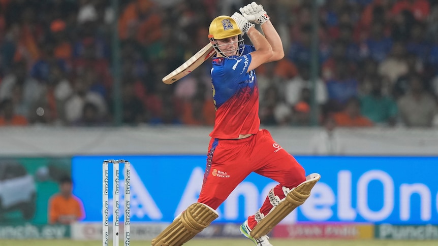 Cameron Green plays a slashing cover drive in an IPL game