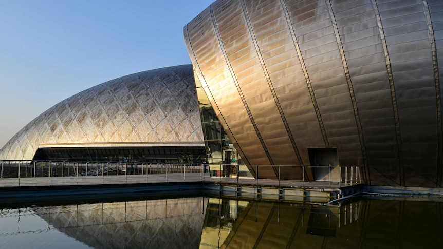 Glasgow Science Centre metallic buildings in low light