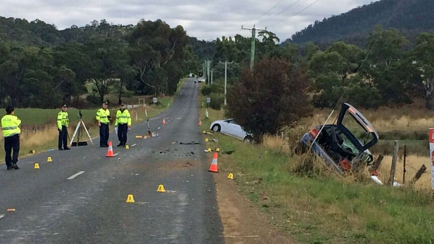 Tasmanian police at the scene of a fatal crash on Colebrook Road, Campania.