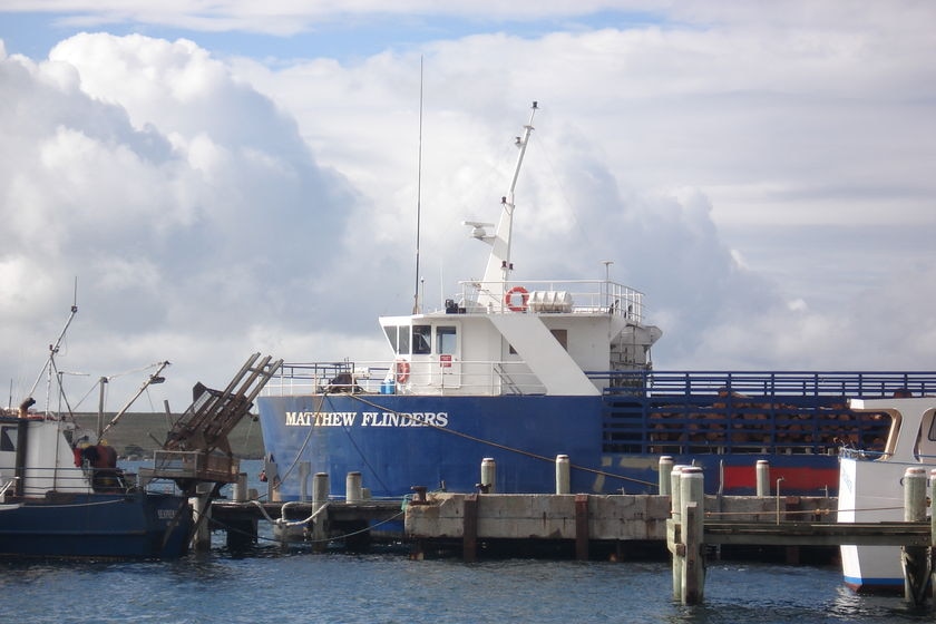 The Southern Shipping ship the Matthew Flinders, tied in port at Lady Barron Wharf.