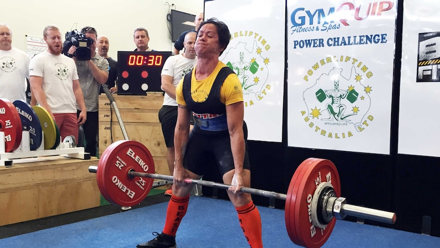 A powerlifting competitor attempts a deadlift at the Canberra event.