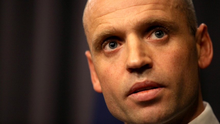 Senator Mark Arbib speaks at a press conference in Canberra after resigning.