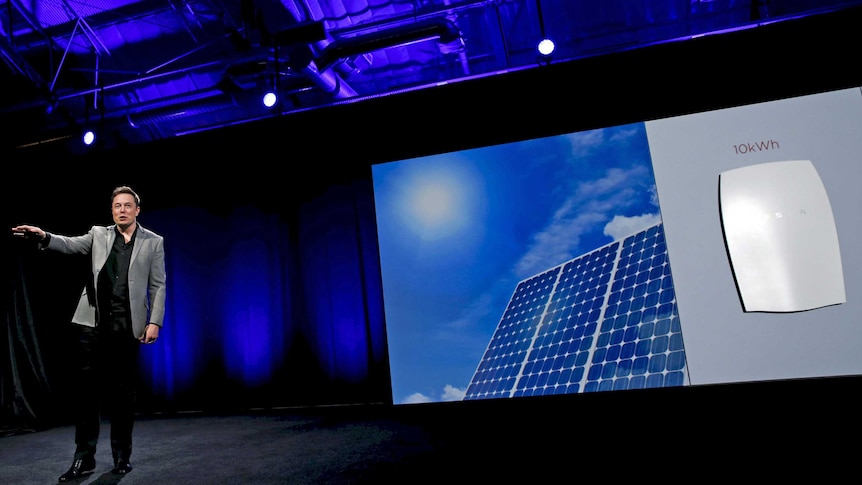 Elon Musk reveals the Tesla powerwall home battery in California on April 30, 2015.