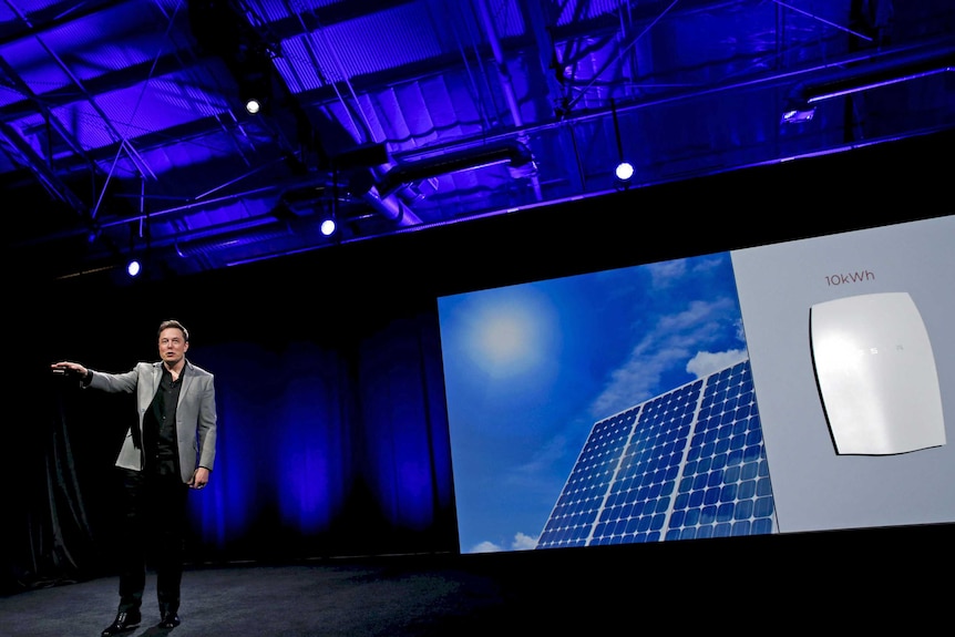 Elon Musk reveals the Tesla powerwall home battery in California on April 30, 2015.