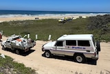 EMergency service vehicles on beach