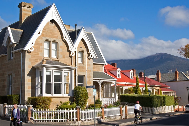 Colonial-style brick houses on a street in Hobart.