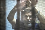 Former Egyptian president Mohammed Morsi in court as death sentence announced