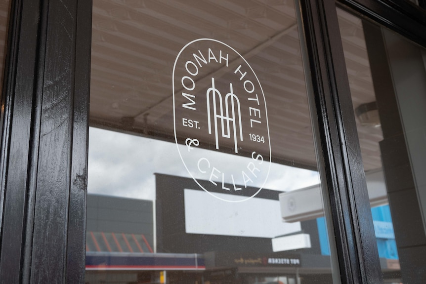 A window sticker showing the Moonah Hotel and Cellars logo.