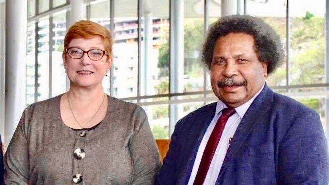 Marise Payne stands with PNG Foreign Soroi Marepo Eoe in Port Moresby.