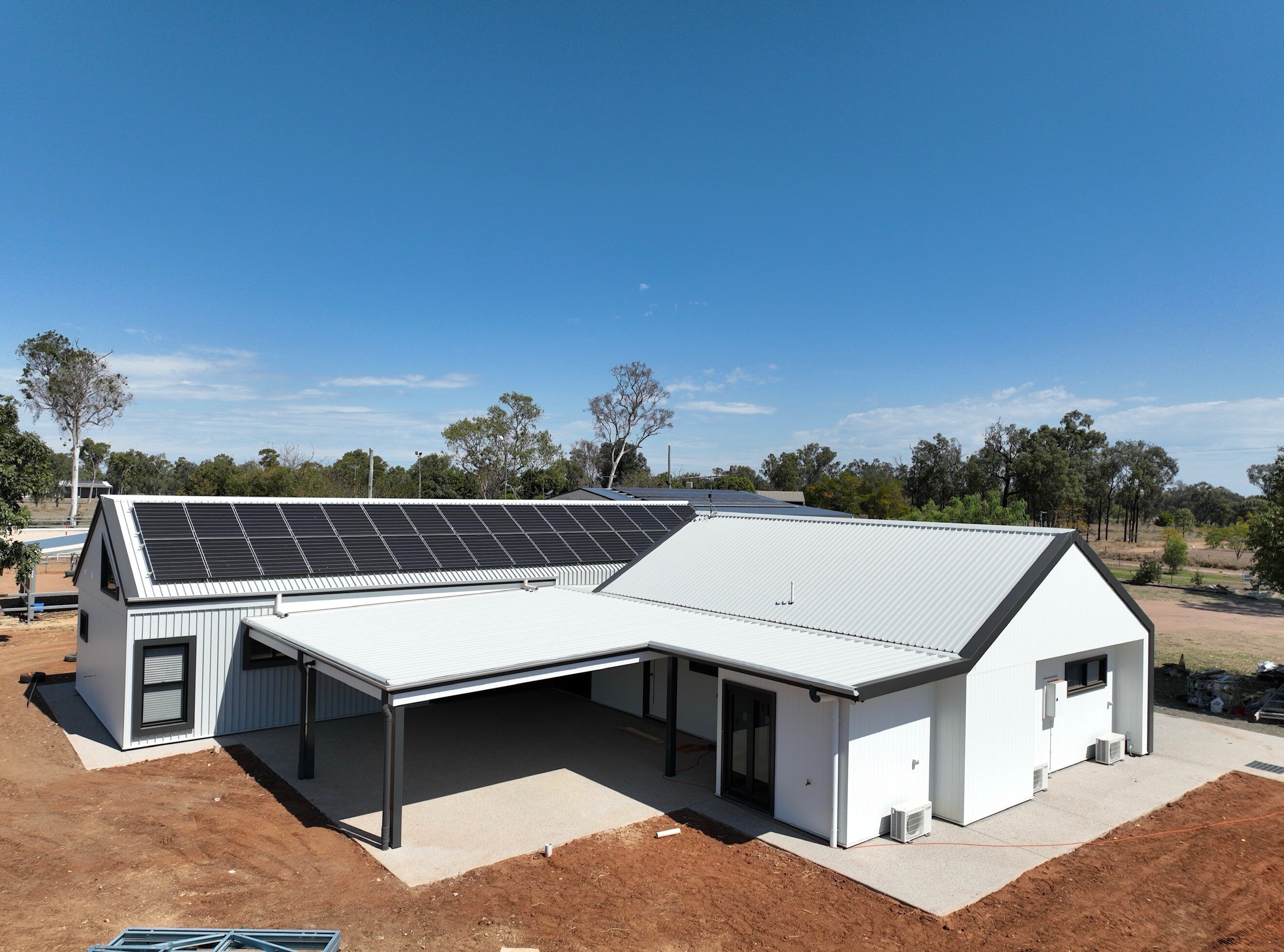 Aerial view of a new house with solar panels
