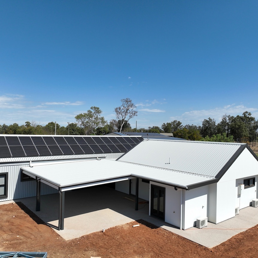 Aerial view of a new house with solar panels