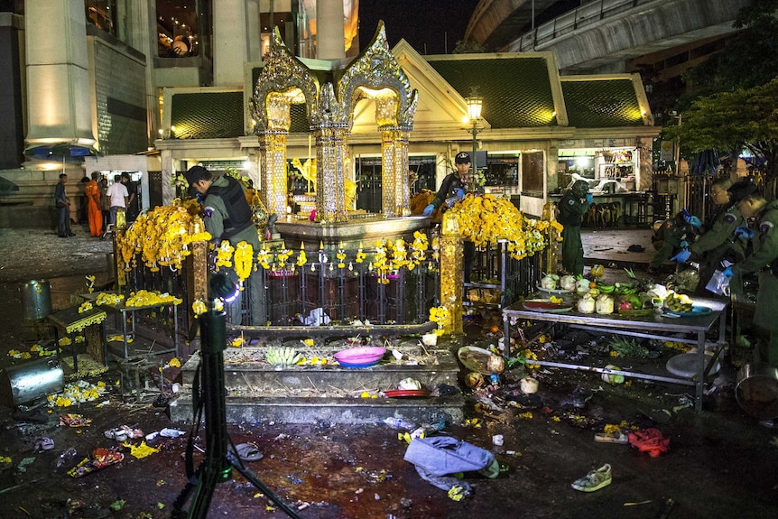 Experts investigate at the Erawan shrine