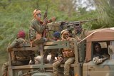 Malian troops patrol Diabaly