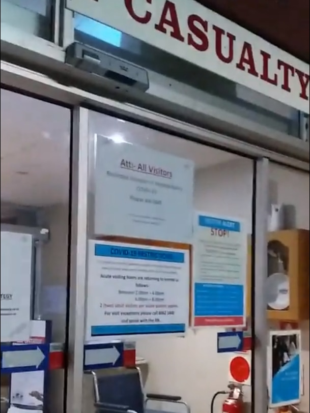 A still from a video showing an electronic sliding door underneath a 'CASUALTY' sign.