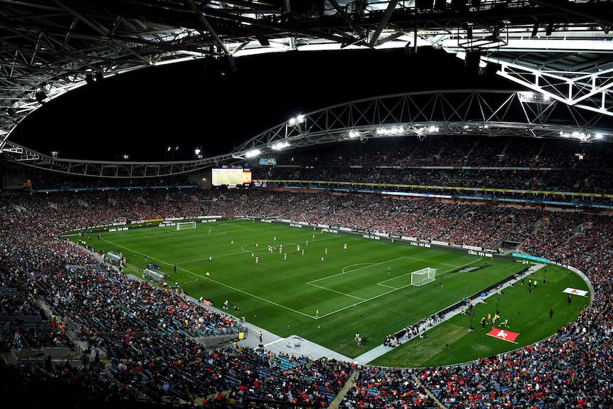 A general view of Sydney's Olympic stadium with a crowd attending a football friendly.